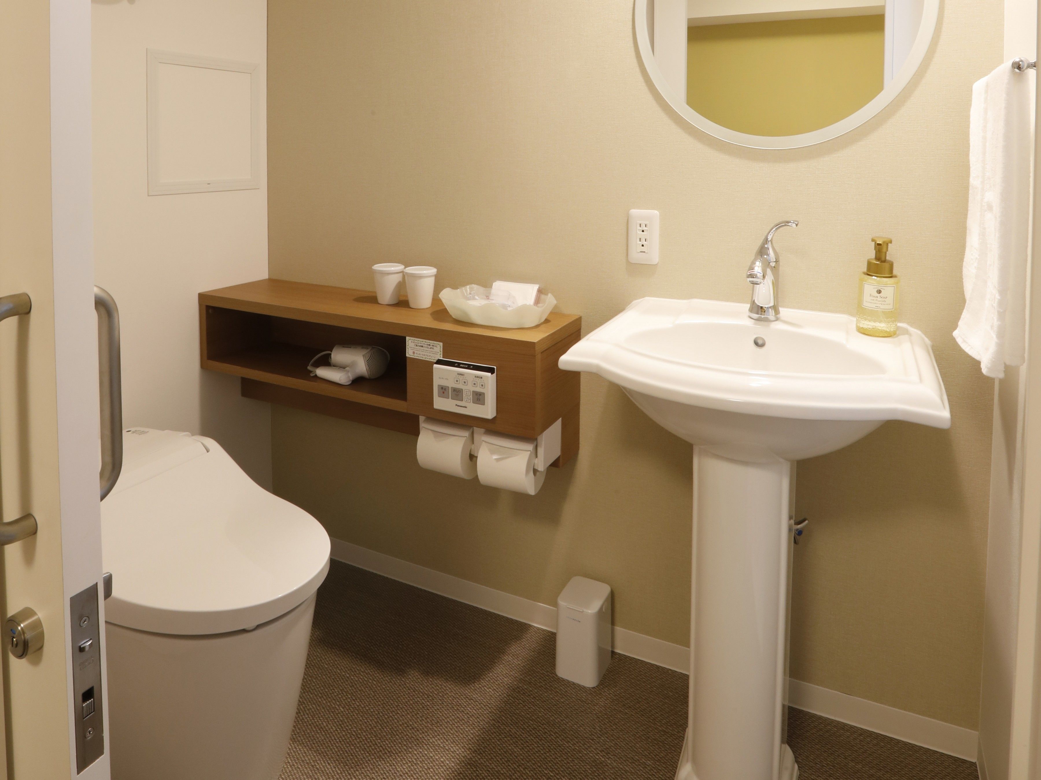 separate bathtub and shower, hair dryer, slippers, electronic bidet