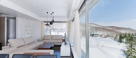 Penthouse, 3 chambres | Coin séjour