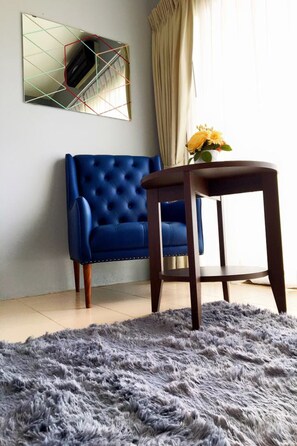 Superior Double Room | Living area | 32-inch LCD TV with cable channels, TV - Phusuang Place (Chiang Mai)