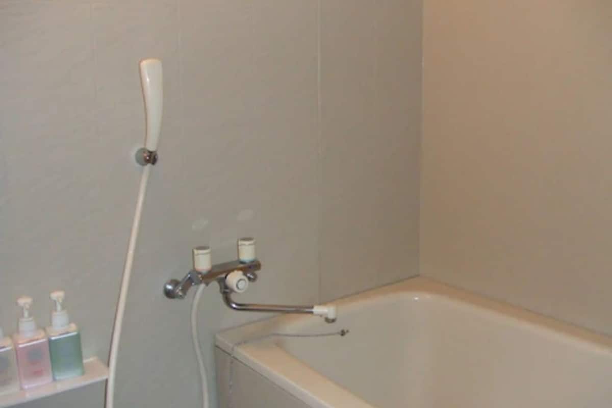 separate bathtub and shower, deep-soaking bathtub, free toiletries