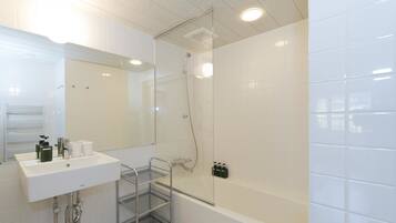 Cottage, 1 Bedroom (+ Loft) | Bathroom | Combined shower/bathtub, hair dryer, slippers, towels