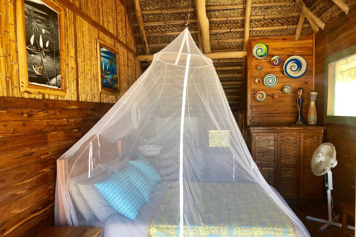 Panoramic Chalet, 2 Bedrooms, Ocean View | 2 bedrooms, individually decorated, individually furnished, desk