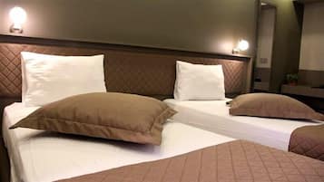 Economy Double or Twin Room | Minibar, desk, blackout curtains, soundproofing