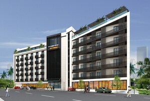 A modern hotel with a prominent AT HOME HOTEL sign, multiple balconies, and a parking area with cars.