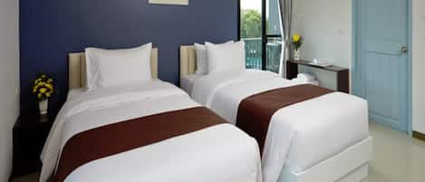 Desk, blackout curtains, free WiFi, bed sheets