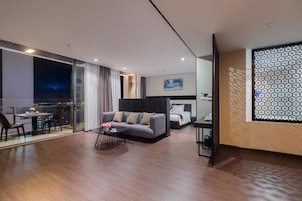 Poseidon Suite | Minibar, in-room safe, individually decorated, desk