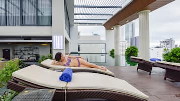 Outdoor pool, open 6:00 AM to 6:00 PM, sun loungers