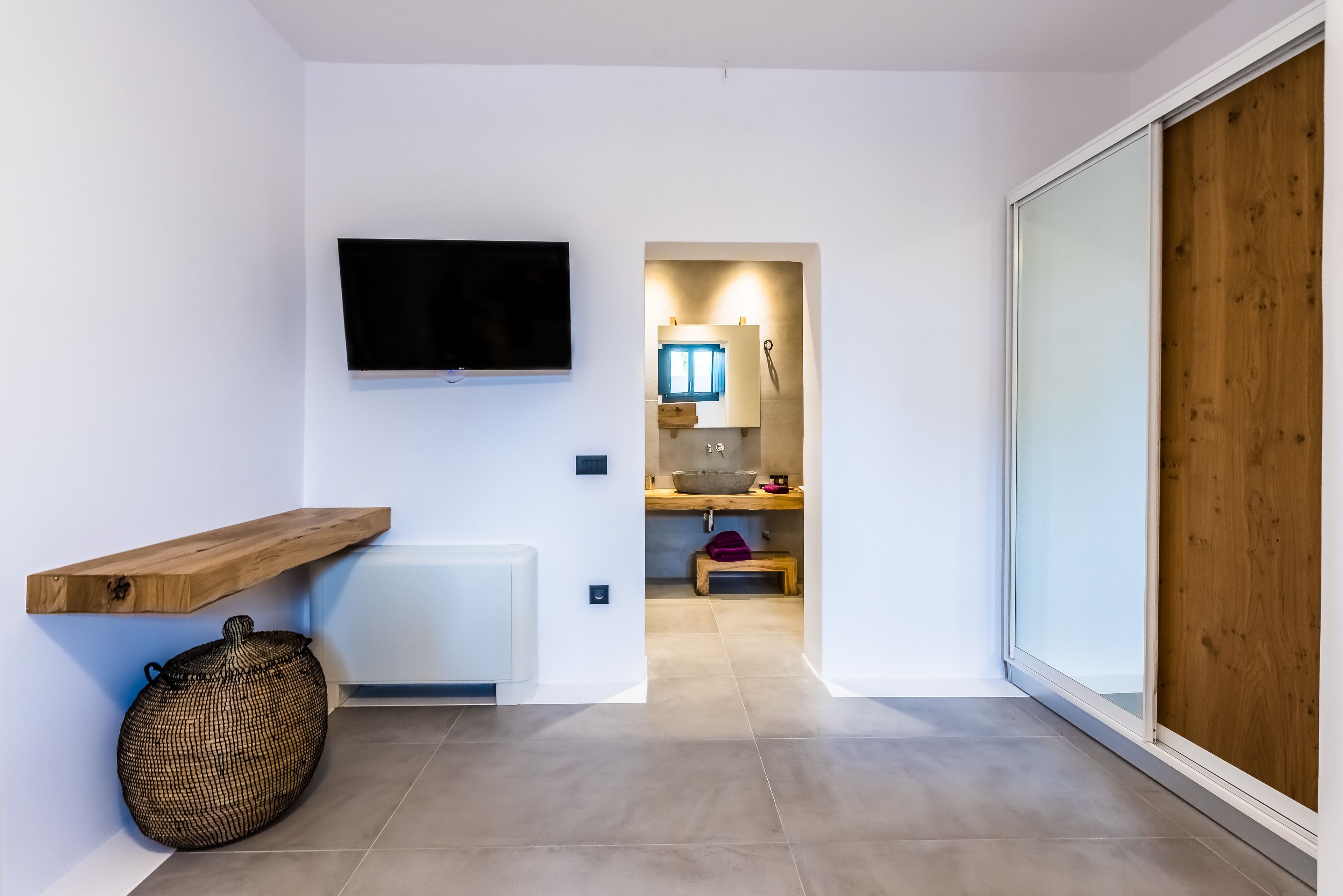 standard room with patio (semi basement) | egyptian cotton sheets, premium bedding, in-room safe, desk