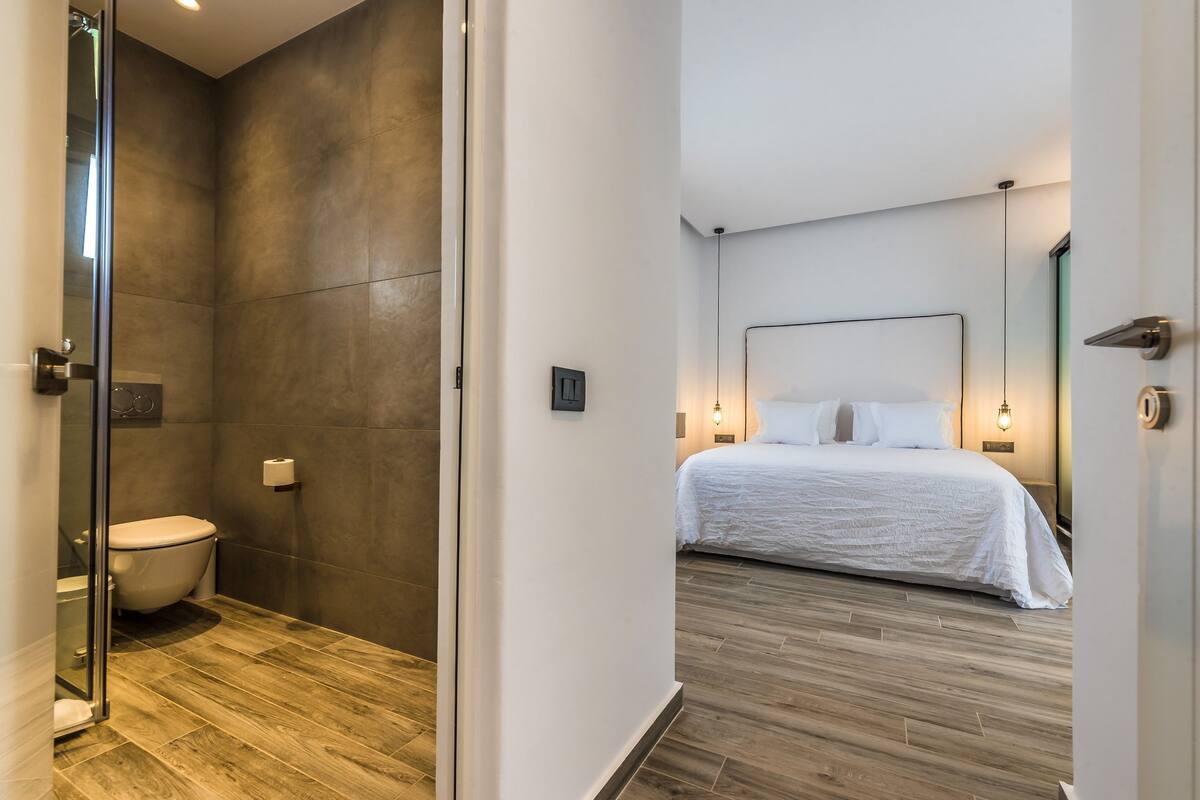 luxury villa, multiple beds | bathroom | shower, rainfall showerhead, free toiletries, hair dryer