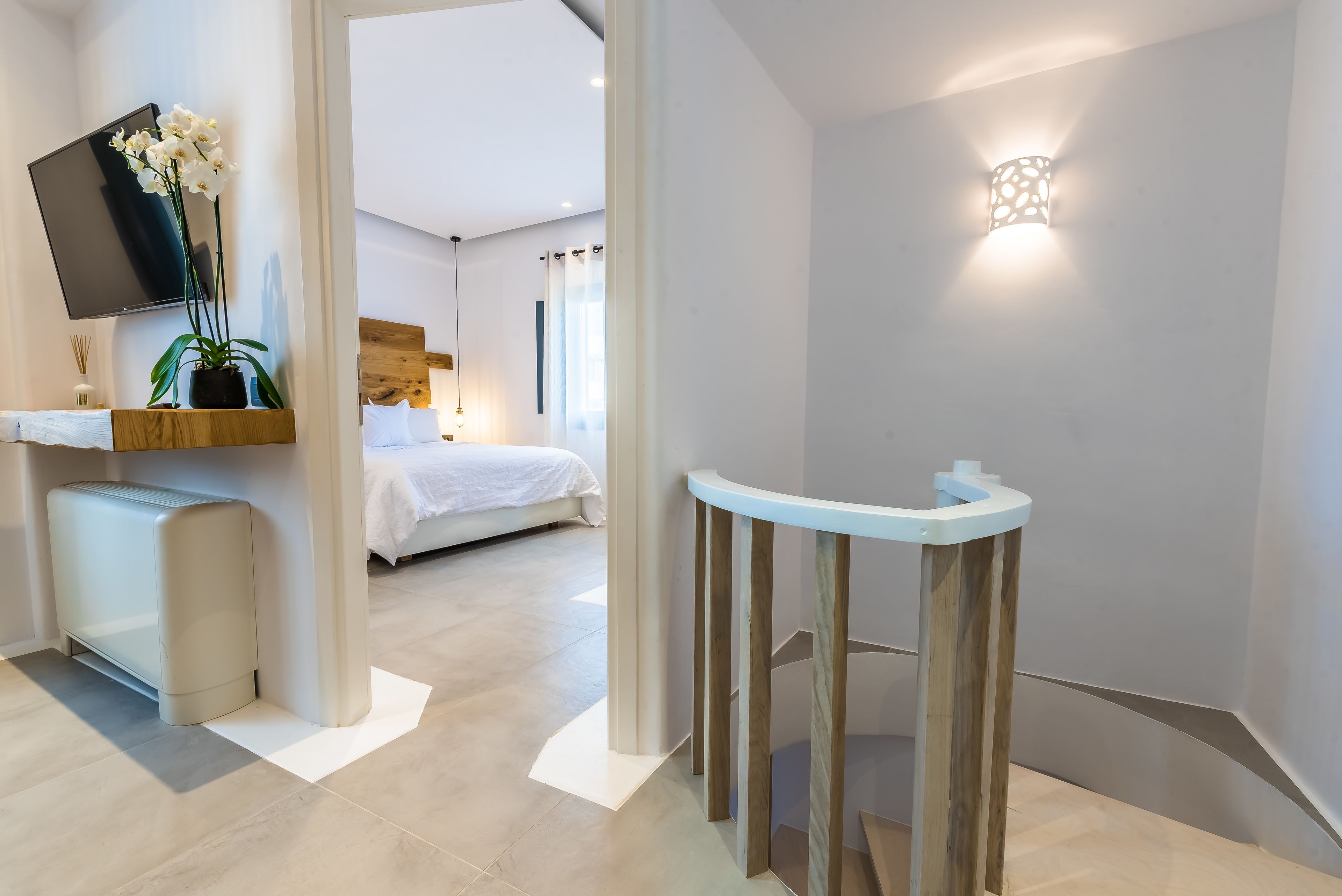 deluxe two bedrooms suite | living area | 43-inch flat-screen tv with cable channels, tv