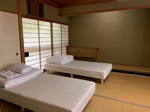 Basic Quadruple Room, Japanese Futon | 1 bedroom, free WiFi, bed sheets - ZEN Hostel (Yamanouchi)