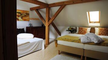 Triple Room | Hypo-allergenic bedding, minibar, in-room safe, individually decorated