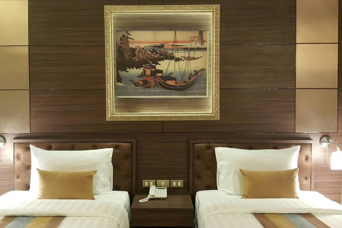 superior room, 2 single beds, non smoking, private bathroom | free minibar items, in-room safe, individually decorated, desk