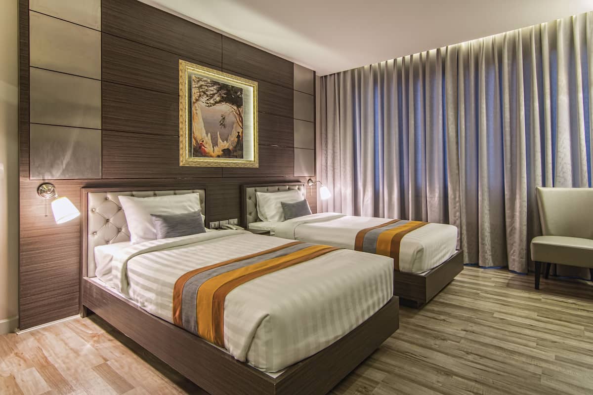 superior room, 2 single beds, non smoking, private bathroom | free minibar items, in-room safe, individually decorated, desk