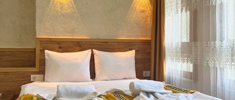 Premium bedding, in-room safe, desk, soundproofing