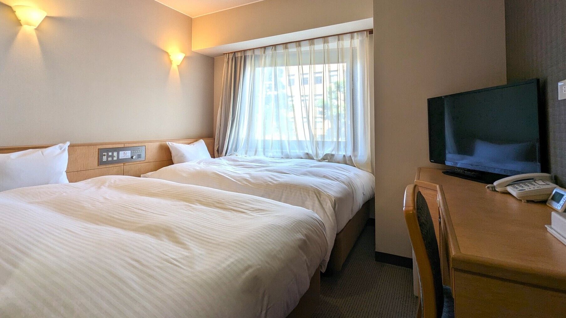 Down comforters, desk, blackout drapes, free WiFi
