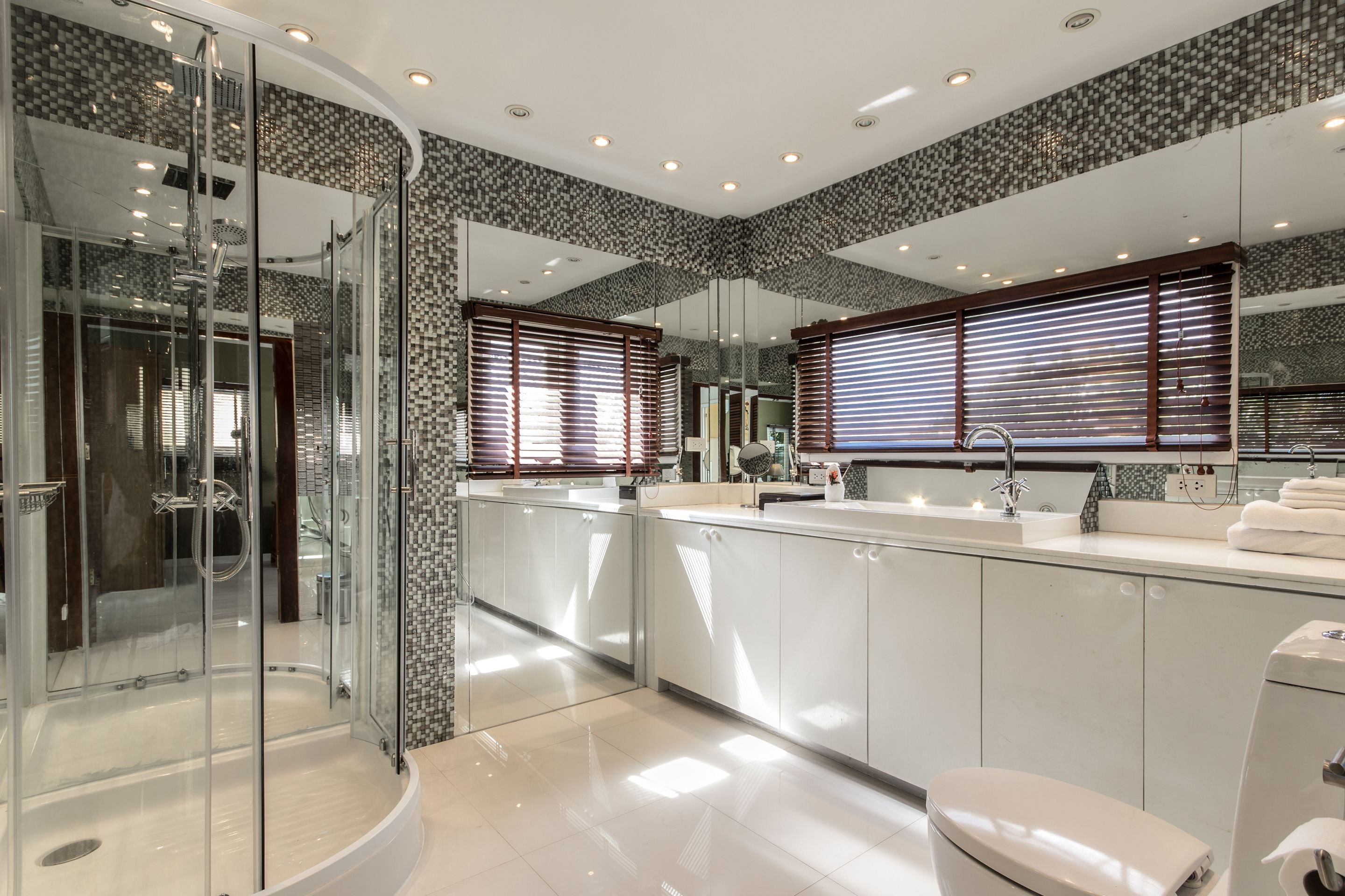 ocean view executive 1-bedroom villa | bathroom | shower, designer toiletries, hair dryer, bathrobes