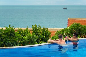 Outdoor pool, pool umbrellas, sun loungers