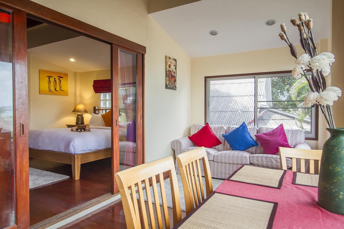 Ocean front deluxe 2-bedroom Villa | Living area | Flat-screen TV