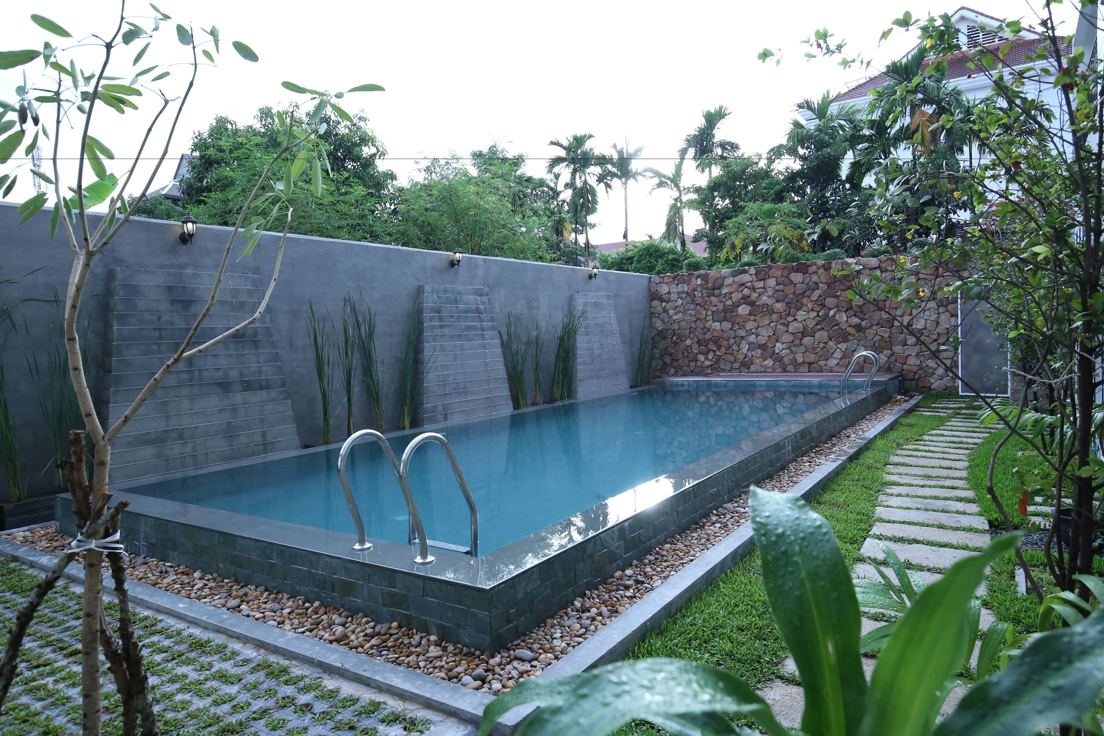 outdoor pool, pool umbrellas, pool loungers