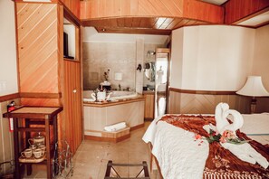 Honeymoon Villa, 1 King Bed, Jetted Tub | In-room safe, individually decorated, individually furnished, desk