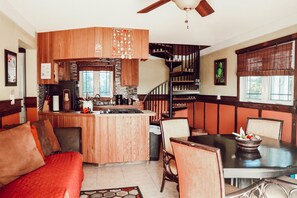 Family Townhome, 3 Bedrooms | Living room | Flat-screen TV, iPod dock - EMBRACE Resort (Staniel Cay)