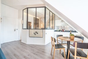 1 Bedroom apartment city view - 34m2 | Living area | Flat-screen TV, tablet - Yuna Les Halles - Serviced Apartments (Paris)