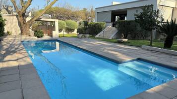 Seasonal outdoor pool, sun loungers