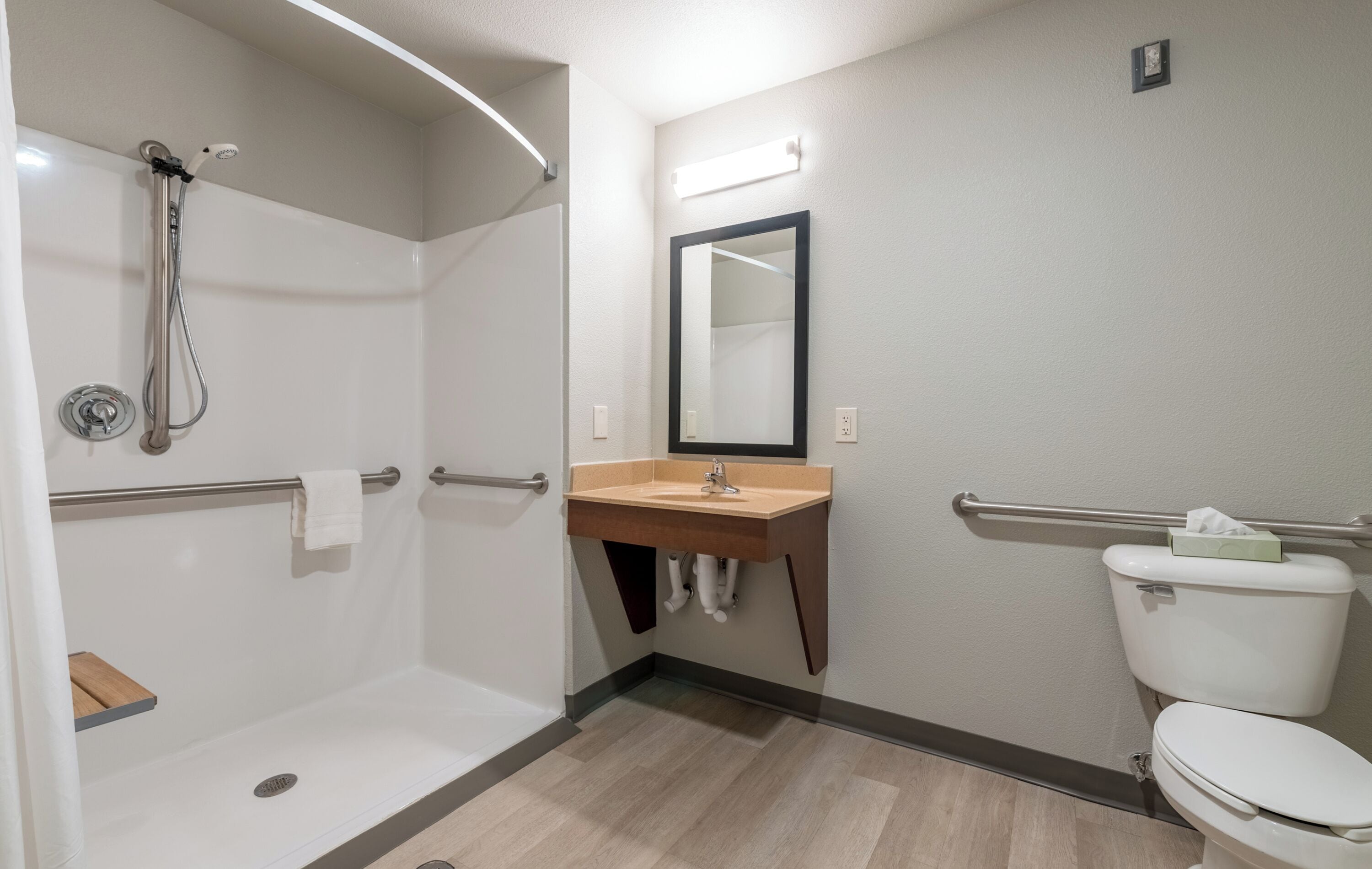 room, 1 queen bed (roll in shower) | bathroom | combined shower/bathtub, free toiletries, hair dryer, towels