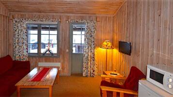 Basic Condo (Bedding optional) | Khu phòng khách | TV màn hình phẳng