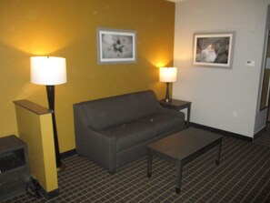 Suite, 1 King Bed, Non Smoking, Refrigerator & Microwave | Living area | 43-inch LED TV with cable channels, TV, pay movies