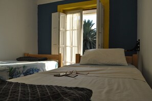 Economy Quadruple Room, Shared Bathroom, Tower | Iron/ironing board, free WiFi