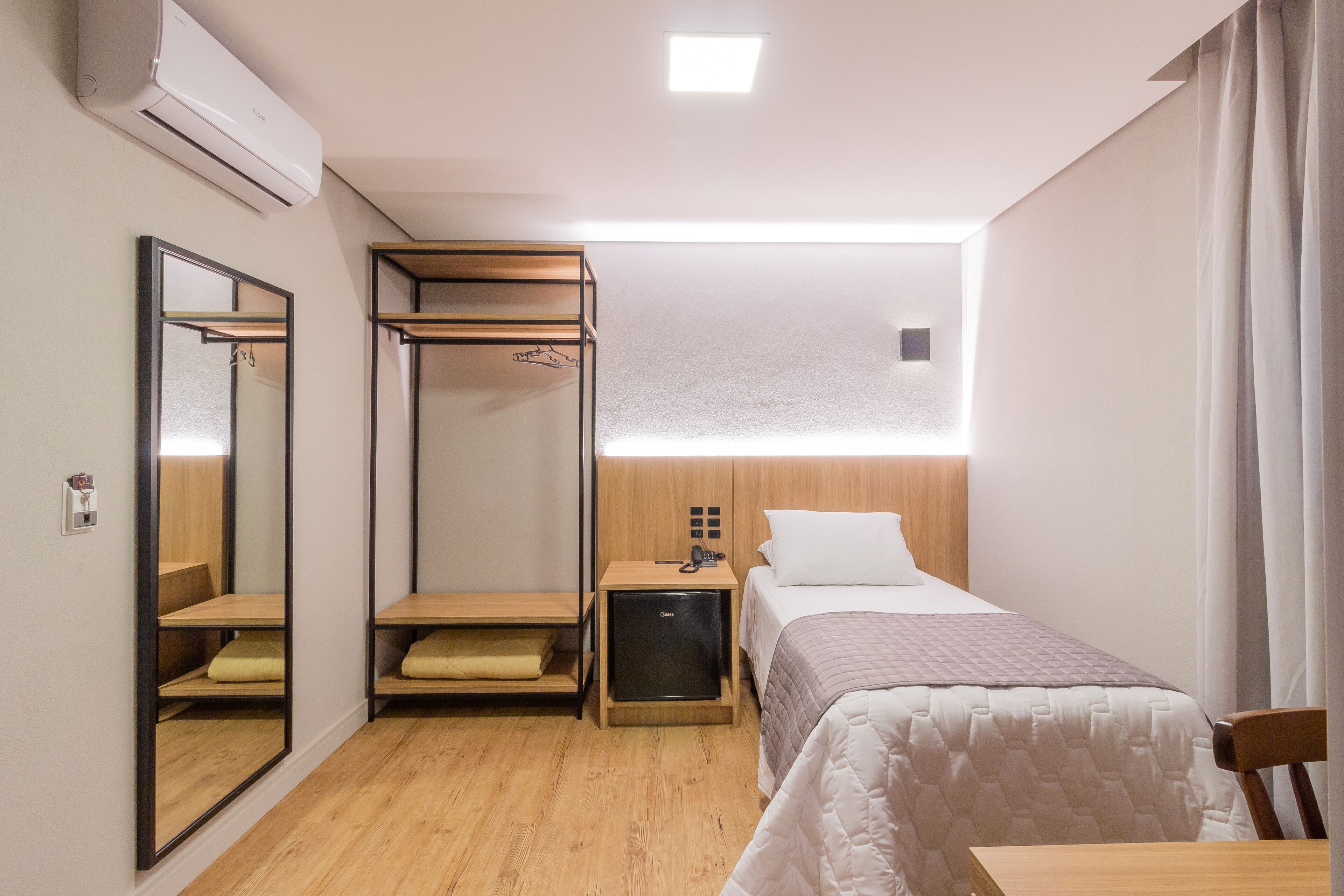 standard single room | minibar, individually decorated, desk, blackout curtains