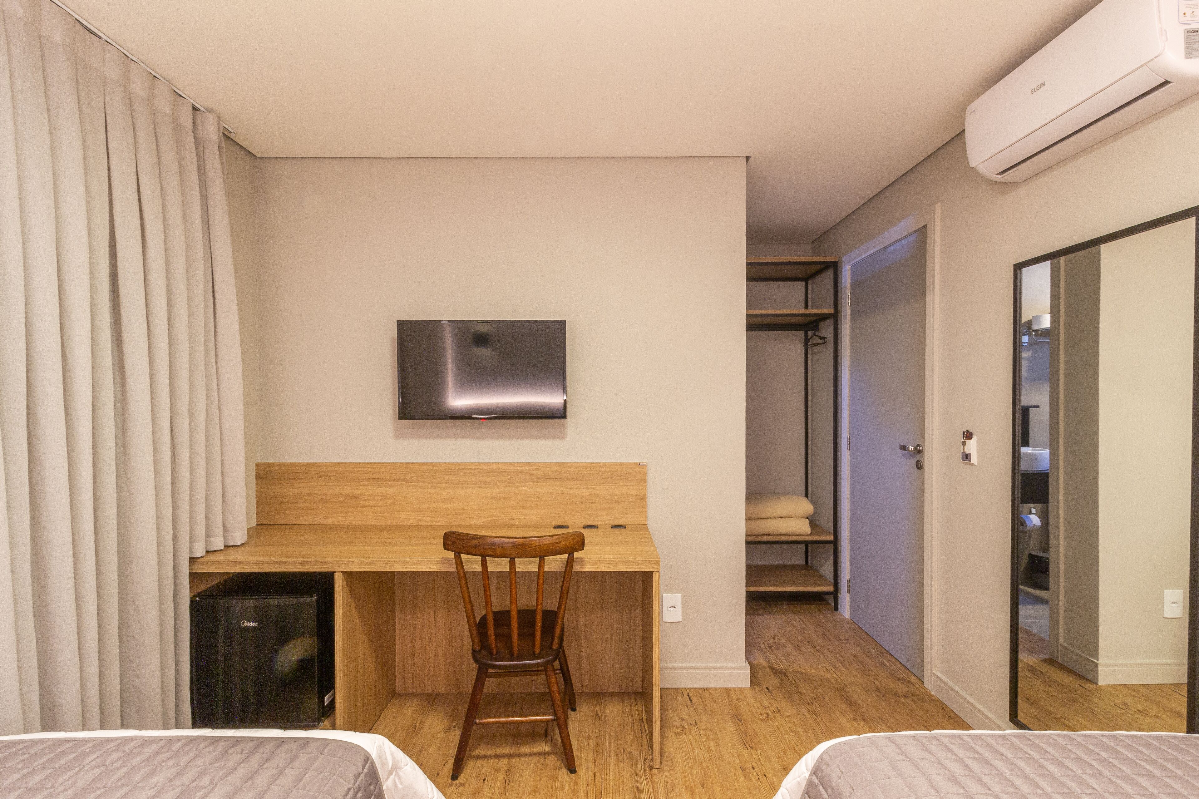 standard double or twin room | minibar, individually decorated, desk, blackout curtains