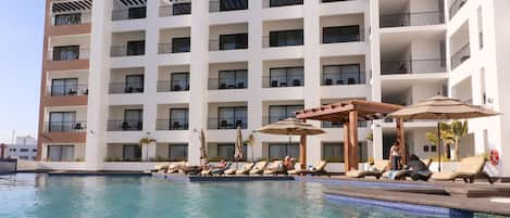 Outdoor pool, pool umbrellas, pool loungers