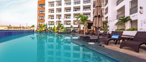 Outdoor pool, pool umbrellas, pool loungers