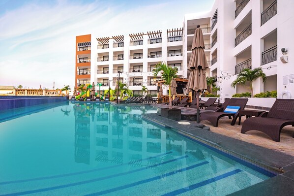 Outdoor pool, pool umbrellas, pool loungers