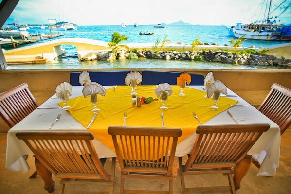 Breakfast, lunch, dinner served; local cuisine 