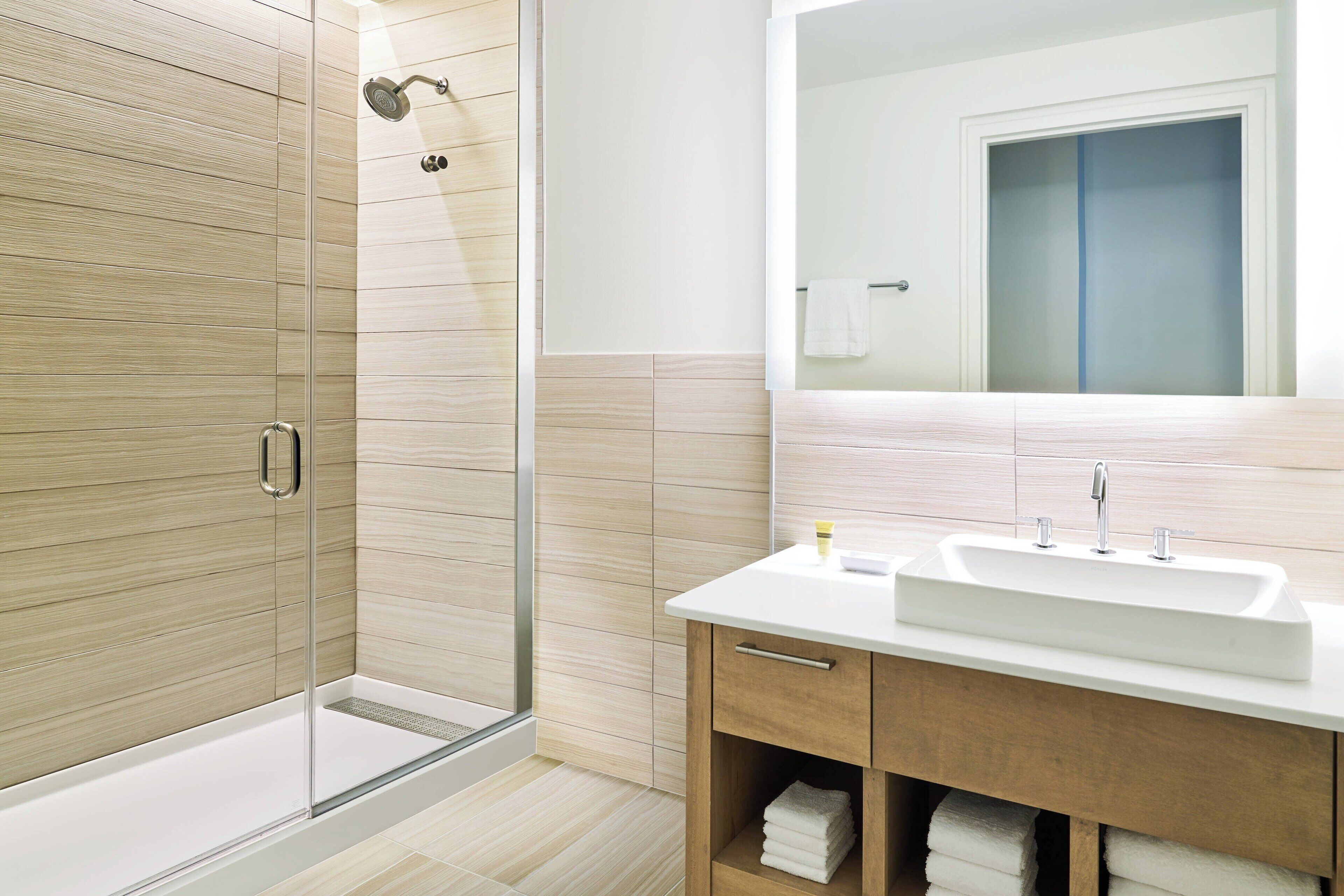 shower, free toiletries, hair dryer, towels