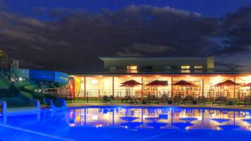 2 outdoor pools, open 7:00 AM to 7:00 PM, pool umbrellas, pool loungers