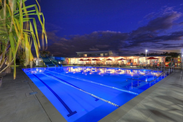 2 outdoor pools, open 7:00 AM to 7:00 PM, pool umbrellas, pool loungers