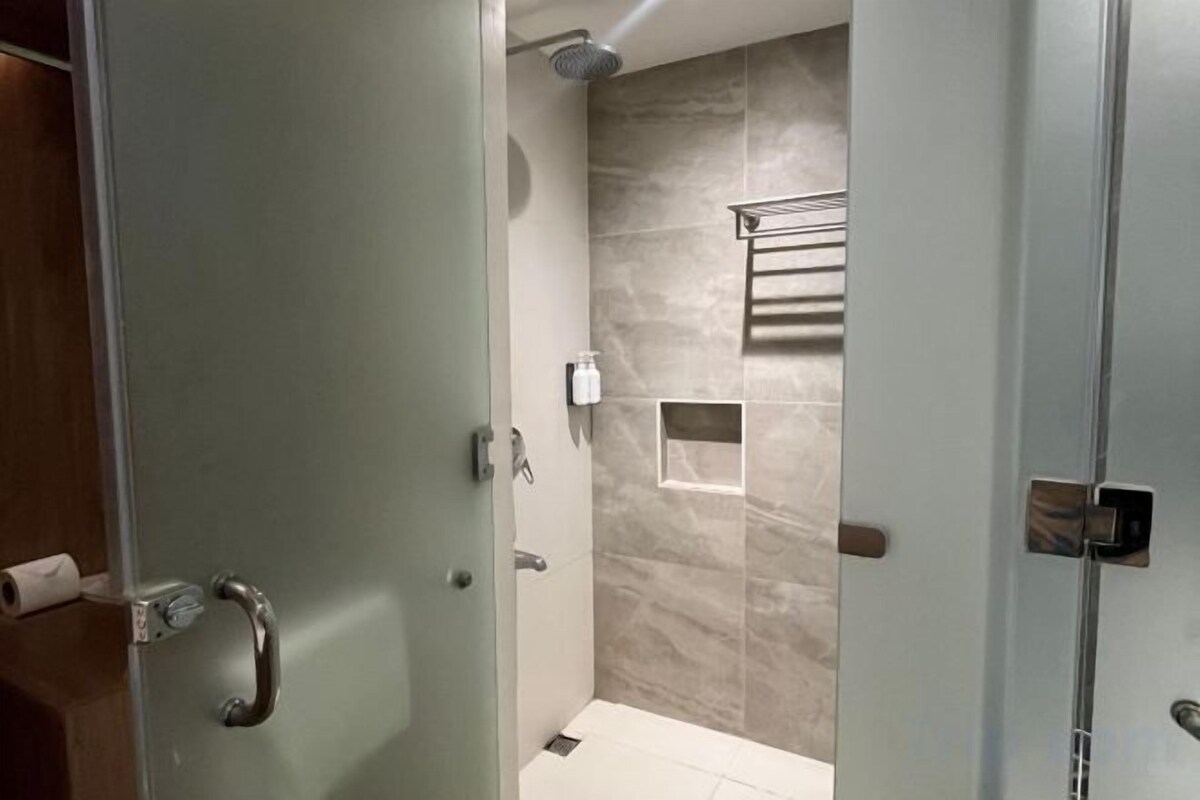 Shower, free toiletries, hair dryer, bathrobes