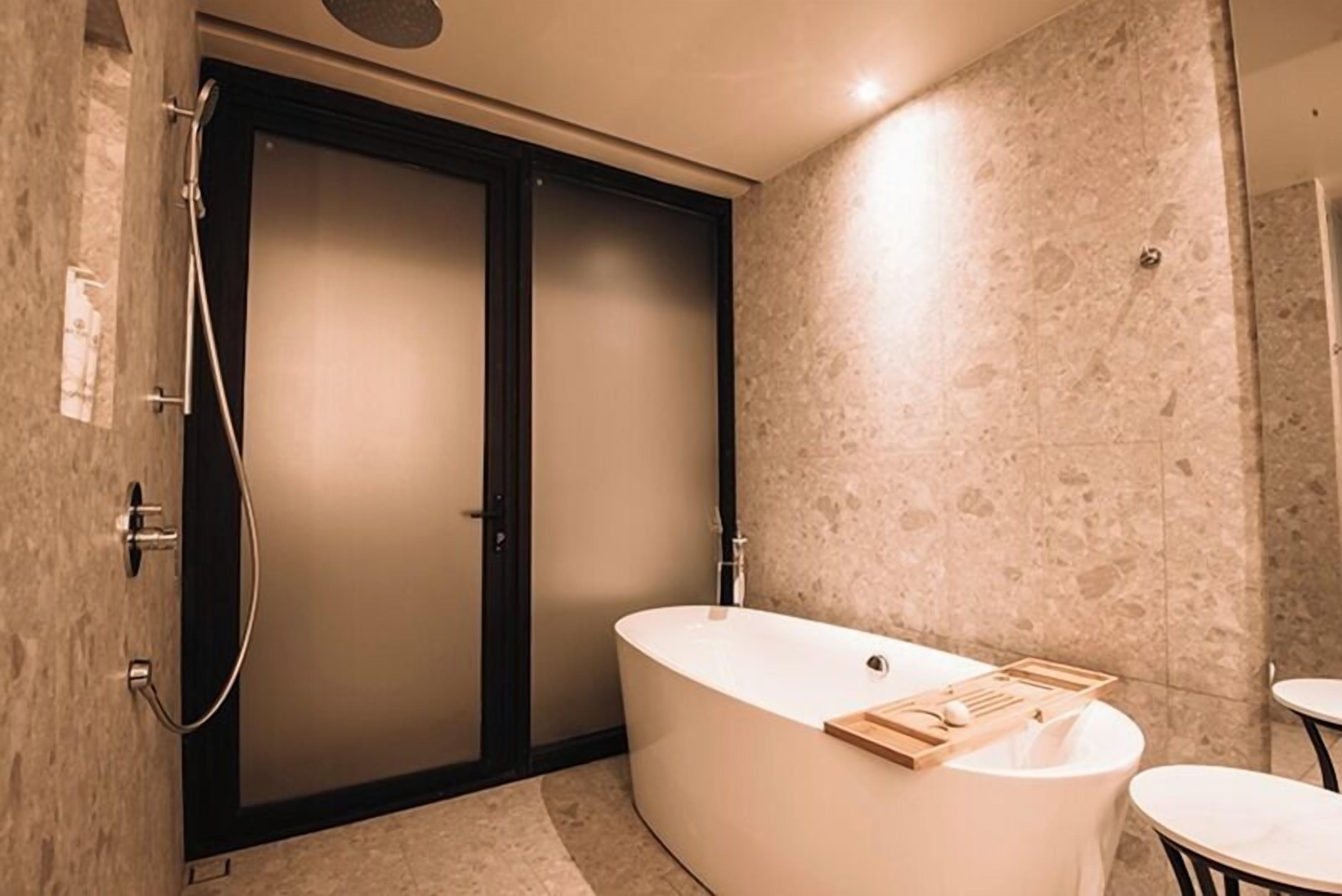 luxury villa | bathroom | shower, free toiletries, slippers, towels