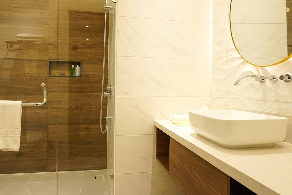 family room | bathroom | shower, free toiletries, slippers, towels