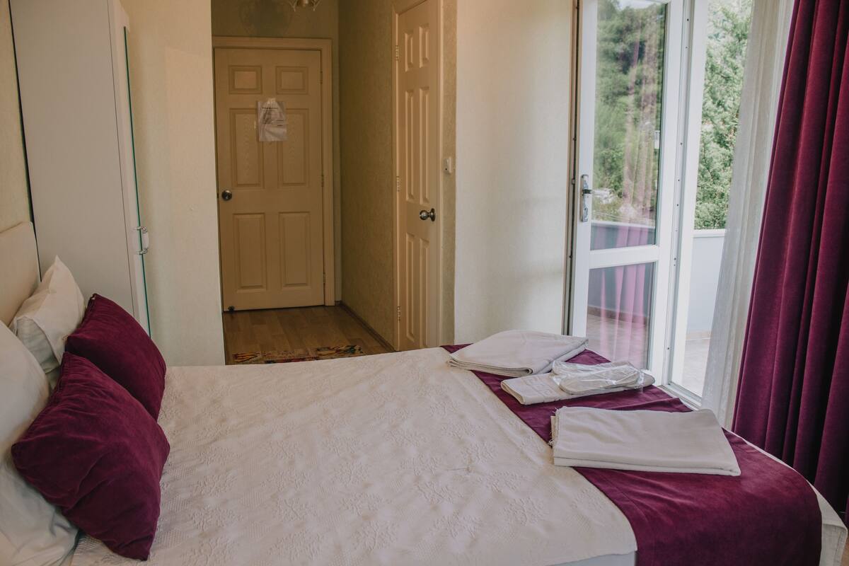 Deluxe Room | Escritorio, wifi gratis y ropa de cama