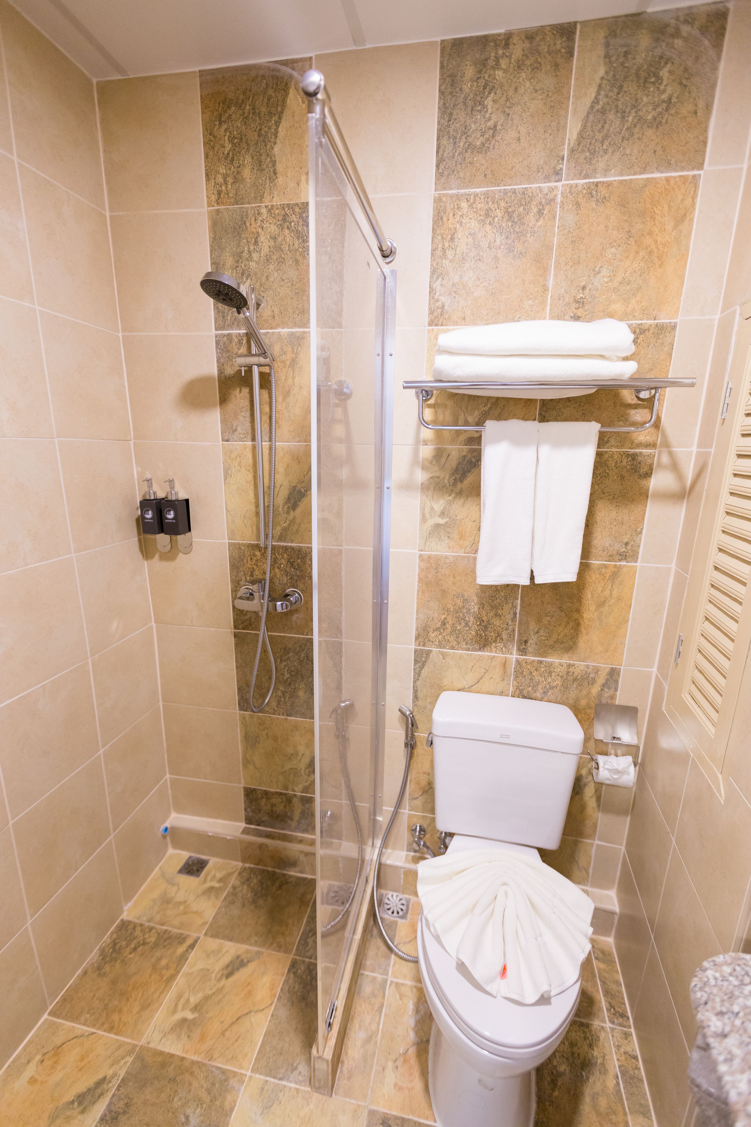 two bedroom suite | bathroom | shower, free toiletries, hair dryer, slippers