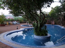 Outdoor pool, open 8:00 AM to 6:00 PM, sun loungers