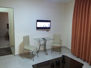 Apartment, 1 Bedroom | Living room | 32-inch LCD TV with satellite channels, TV - Zaina Plaza Hotel (Amman)