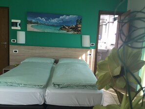 Desk, blackout curtains, soundproofing, free WiFi