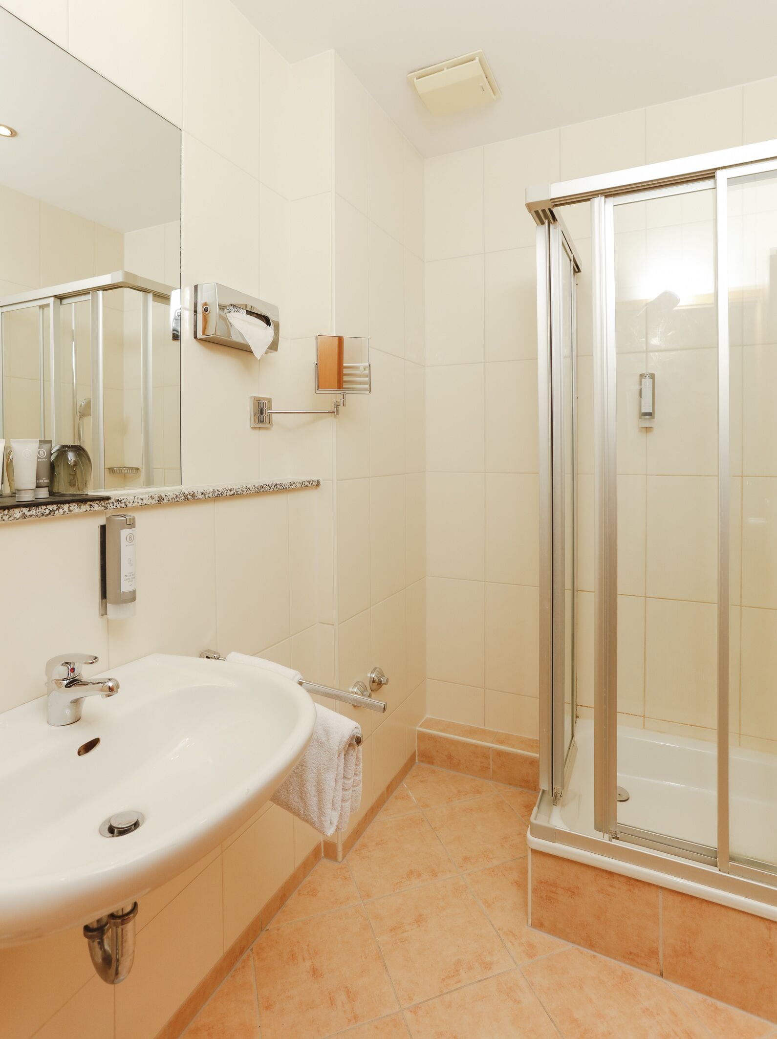 shower, free toiletries, hair dryer, towels